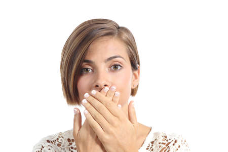 Woman covering her mouth because bad breath isolated on a white backgroundの写真素材