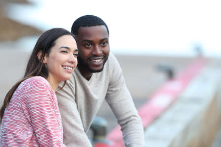 Happy couple flirting contemplating together outdoorsの写真素材