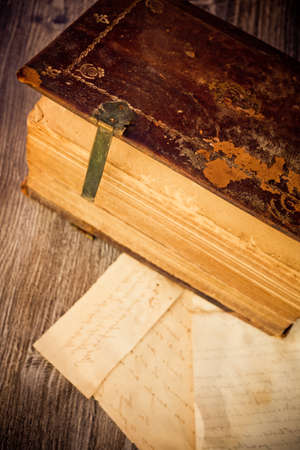 Religious calligraphy from a 300 years old roman book in latin language, creative editing to give the ancient aspectの写真素材