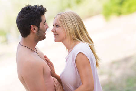 young beautiful couple embracing, selective focusの写真素材