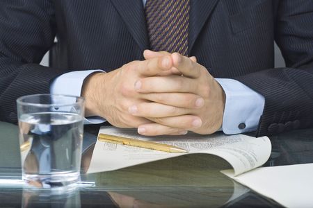 businessman signing an agreement after negotiation in the meeting roomの写真素材