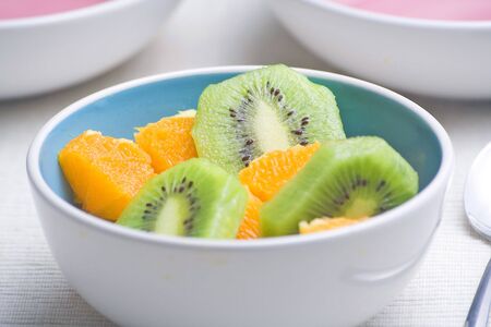 dessert of kiwi and orange slices freshの写真素材