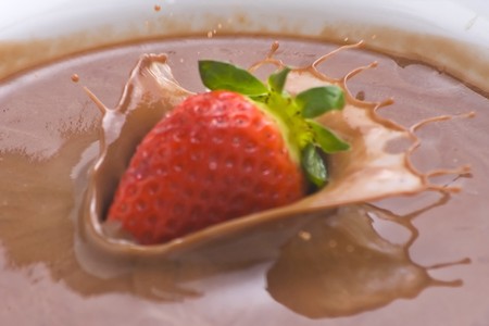 fresh natural strawberry and chocolate with milk isolatedの写真素材
