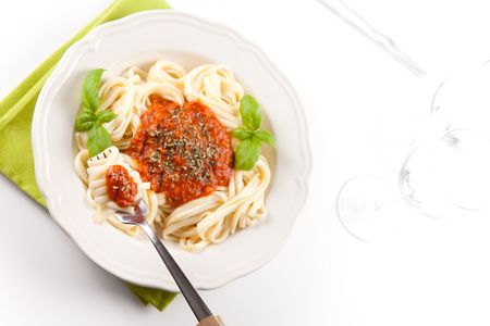 home made bolognese noodles isolated over whiteの写真素材