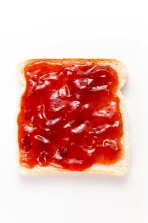 delicious slice of bread with strawberry jam