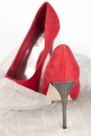 Red high heels isolated over whiteの写真素材