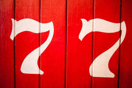 77 is a great number. most of us borned that year and it is becoming popular. this old train is the...