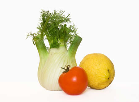Fennel ,tomato and lemon on white backgroundの写真素材