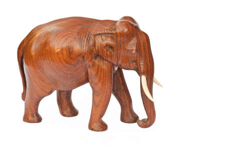 Wooden carved elephant isolated on white backgroundの写真素材