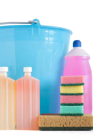 Colored plastic detergent bottles with bucket and sponges isolated on white background with clipping pathの写真素材