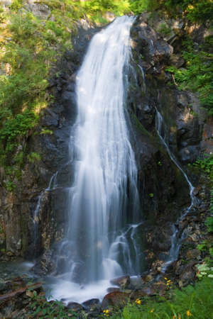 beautiful waterfall in Val di sole, Trentino, Italyの写真素材