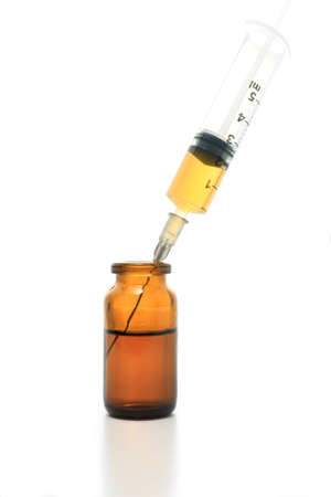 Syringe, glass bottle with drugs isolated on white