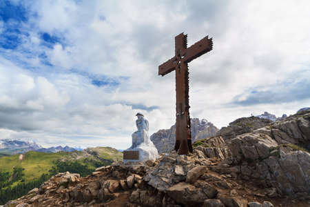 cross and Christ in Castellazzo mount, Rolle pass, Italyの写真素材