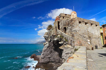 the old castle overlooking the sea in Camogli, Italyの写真素材