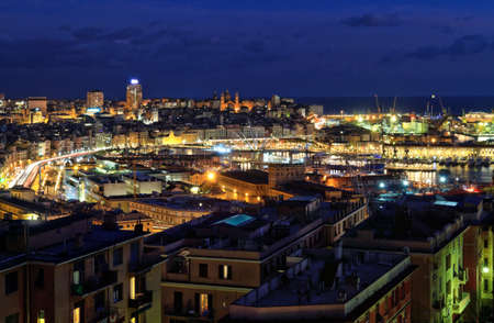 night scene with the port of Genoa, Liguria, Italyの写真素材