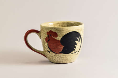 An old chicken cup on white backgroundの写真素材