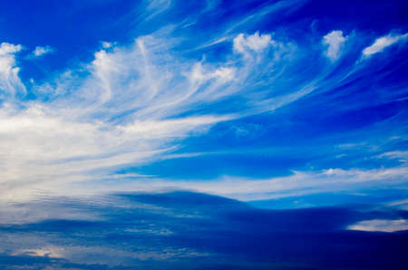 blue sky background with white cloudsの写真素材