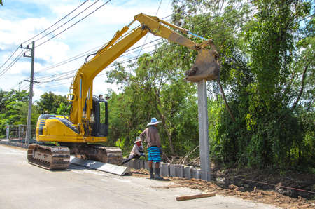 Yellow digger on construction site.の写真素材
