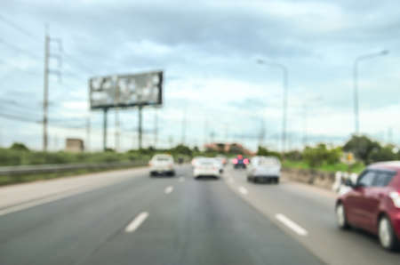 blur background of car traffic on road.