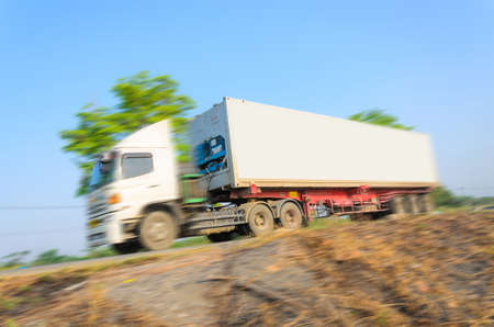 Truck transport container on the road with blue sky background, Motion imageのeditorial素材