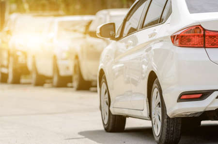 White car driving back traffic jam.の写真素材