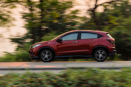 Samut Sakhon, Thailand - March 2019:HONDA HR-V 2018 Motion image, car running on the road with the sunset background, at Samut Sakhon Province on 8 March 2019 in Samut Sakhon, Thailand.のeditorial素材