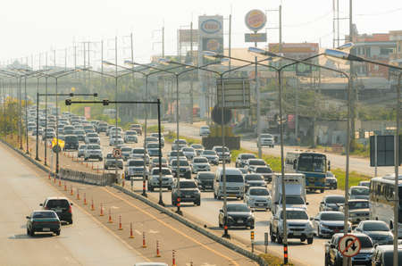 Samut Sakhon Thailand - April 2019 : Cars stands in traffic jam at afternoon at Rama II road on April 16, 2019 in Samut Sakhon, Thailand.のeditorial素材