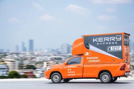Bangkok, Thailand - February 2018 : Kerry express logistic truck running on street for speed service to customer on time on February 3, 2018 at  Bangkok, Thailandのeditorial素材