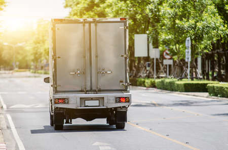 truck running on the road, small truck on the road.の写真素材