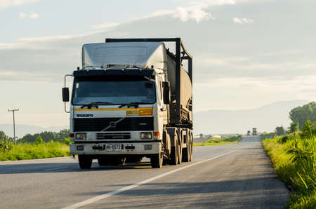 Nakhon Sawan, Thailand - September 2019 : Truck container running on the highway for service to...