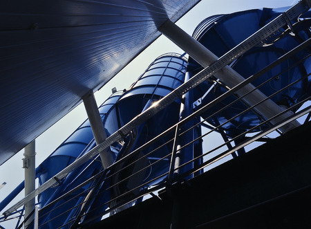 Bottom perspective of storage Tower Silos blueの写真素材