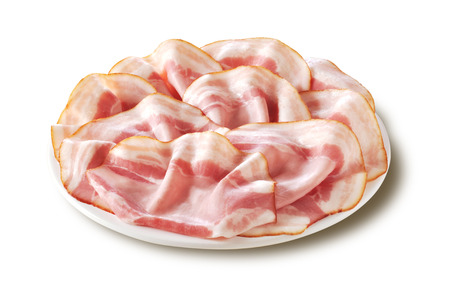 Plate with Slices of Roast Pork on white planeの写真素材