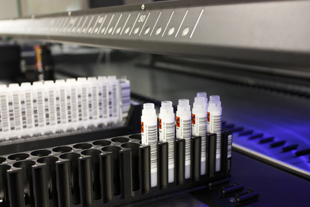 Rack with test tubes of blood and barcode