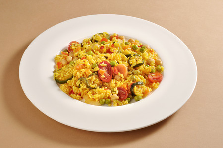 Dish with a portion of vegetarian paellaの写真素材