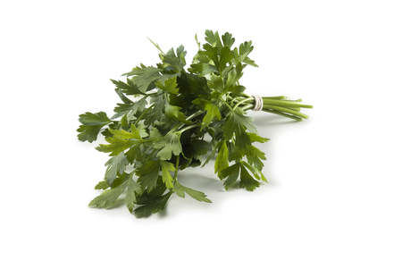 Fresh Bunch of parsley isolated on white backgroundの写真素材