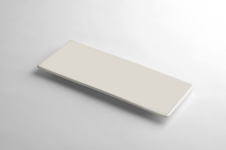 Empty white plate for sushi on white backgroundの写真素材