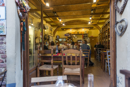 Certaldo Firenze, Italy - july 26, 2017; Typical Tuscan tavern with tourists in summerのeditorial素材