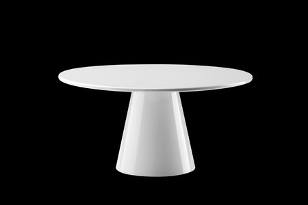 White round stand cake isolated on black backgroundの写真素材