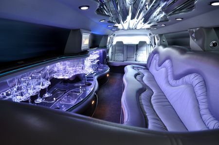Limousine interior with blue colorful lights without peopleの写真素材