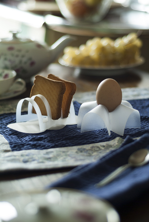 Home Table on Breakfast with boiled egg and toasted breadの写真素材