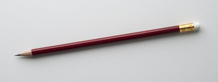 Red Pencil with rubber terminal isolated on white backgroundの写真素材