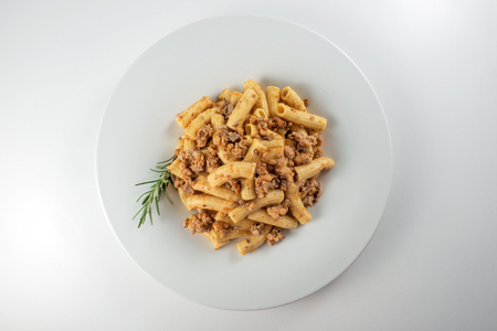 Top view of Plate of macaroni pasta with Bolognese raguÌの写真素材