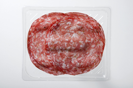 Transparent Tray of Presliced Salame Top Viewの写真素材