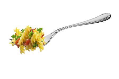 Isolated Fork with fusilli pasta broccoli tomatoes and aromatic herbs on whiteの写真素材