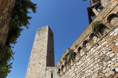 Partial view of San Gimignano Siena Tuscany tower of the Cugnanesiの写真素材