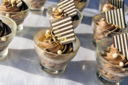 Detail of buffet Portions of dessert with chocolate mousseの写真素材