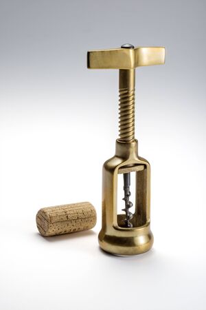 Brass screw corkscrew with stopper isolated with clipping pathの写真素材