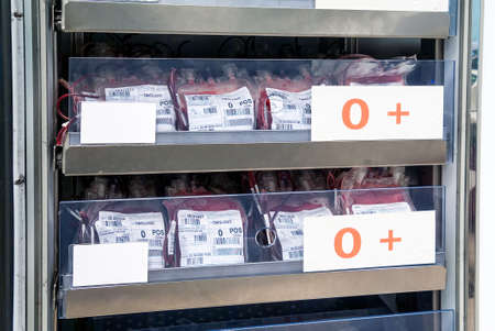 Milan, Italy - November 18, 2020: Detail of Refrigerated cabinet with stocks of blood bags in the...