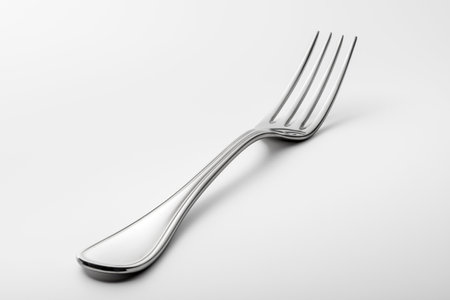 Empty Steel Fork isolated on white backgroundの写真素材