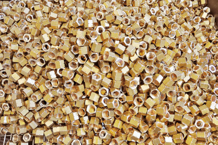 Background of stack newly made brass fittingsの写真素材